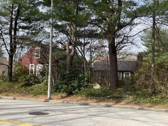 301 May St, Worcester, MA 01602 - view of property exterior with a chimney