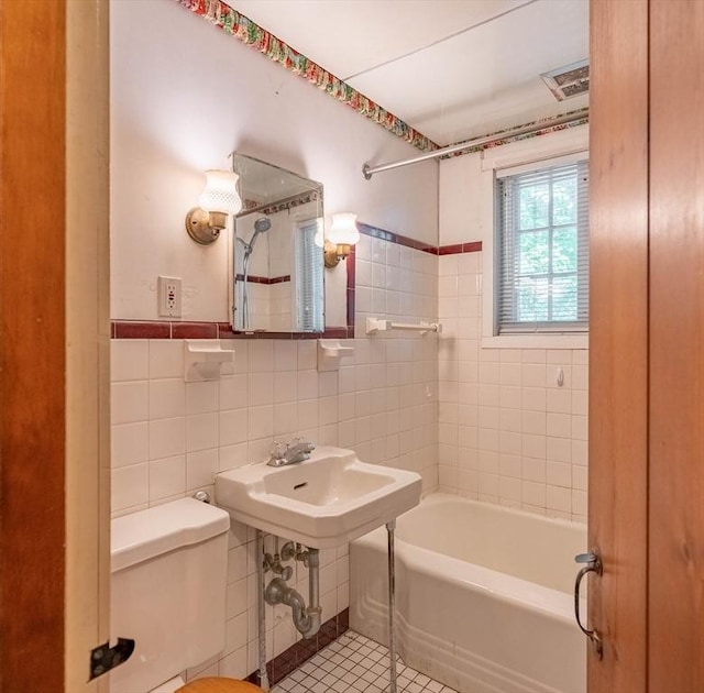 301 May St, Worcester, MA 01602 - full bathroom with tile walls, toilet, and tile patterned floors