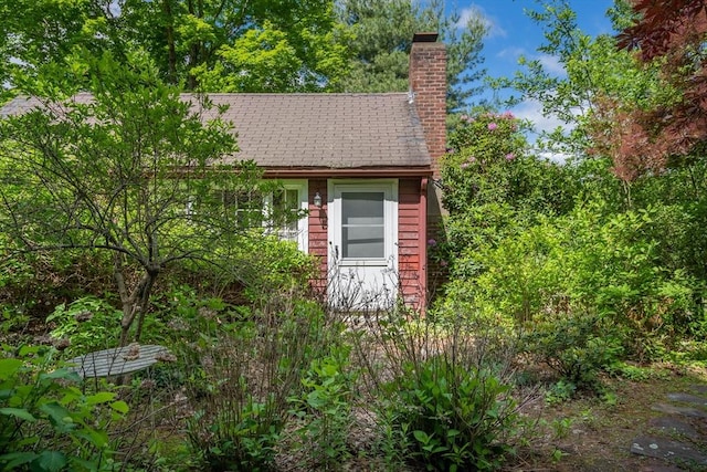 301 May St, Worcester, MA 01602 - view of property exterior featuring a chimney