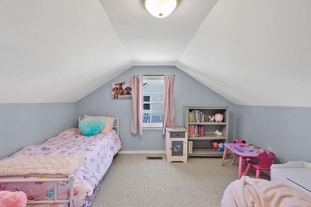 bedroom featuring carpet floors, visible vents, and lofted ceiling