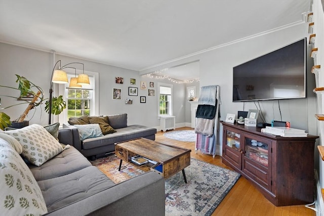 60 Brookfield Rd, Sturbridge, MA 01518 - living room with wood finished floors, crown molding, and a chandelier