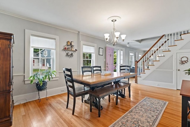 60 Brookfield Rd, Sturbridge, MA 01518 - dining area with a chandelier, stairway, light wood finished floors, and ornamental molding