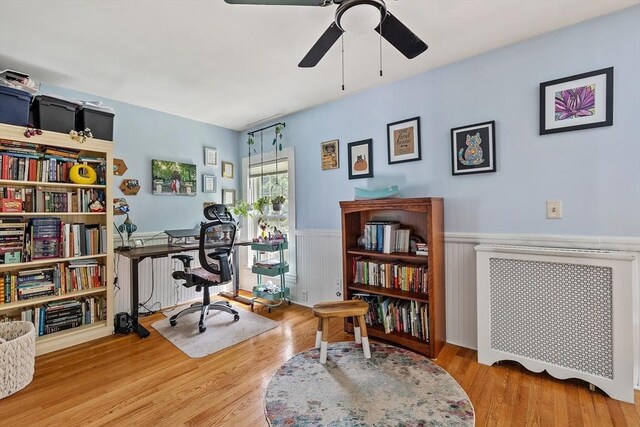 60 Brookfield Rd, Sturbridge, MA 01518 - office space featuring wainscoting, ceiling fan, wood finished floors, and radiator
