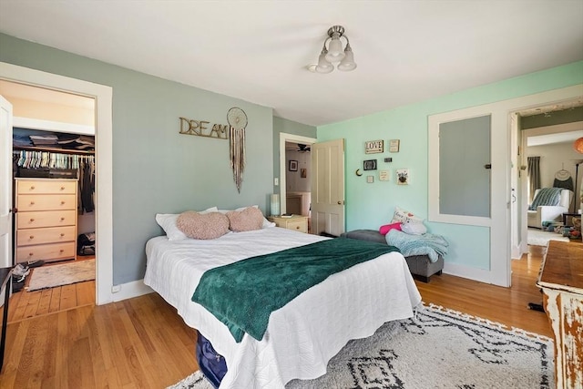 60 Brookfield Rd, Sturbridge, MA 01518 - bedroom featuring wood finished floors, a spacious closet, and a closet