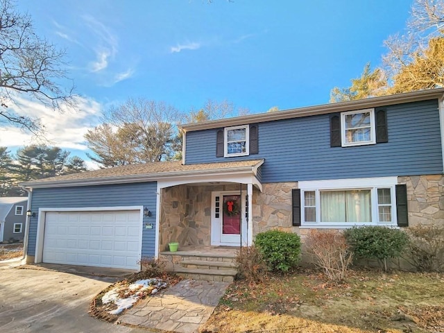 front of property featuring a garage