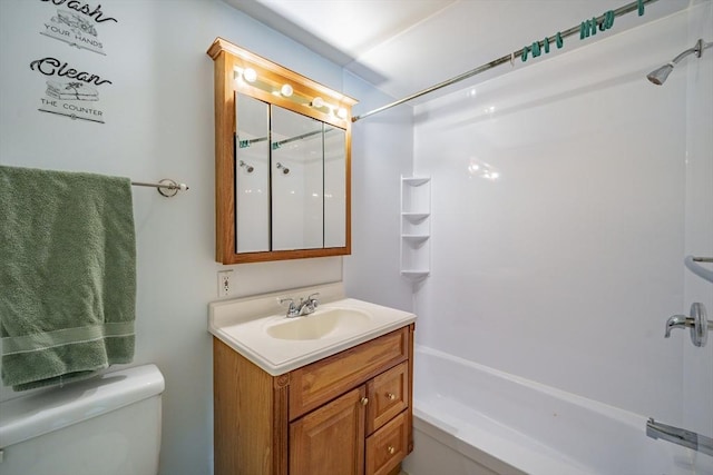 bathroom featuring shower / tub combination, toilet, and vanity