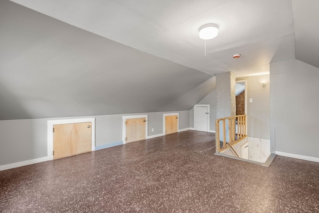 bonus room featuring lofted ceiling