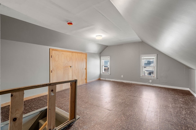 bonus room with vaulted ceiling