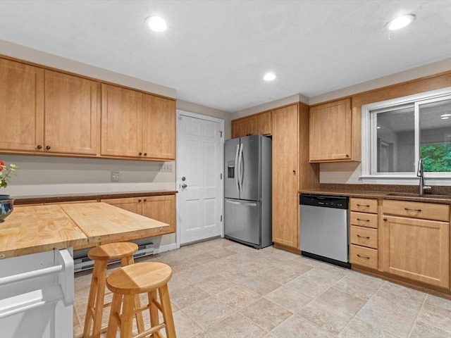 182 W Main St, Westborough, MA 01581 - kitchen with stainless steel appliances, a sink, recessed lighting, and wooden counters