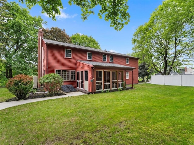 182 W Main St, Westborough, MA 01581 - back of house featuring a chimney, a sunroom, and a shingled roof