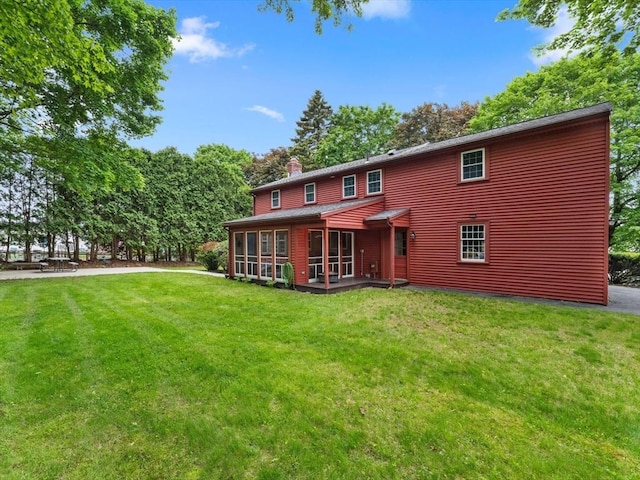 182 W Main St, Westborough, MA 01581 - back of house with a chimney and a yard