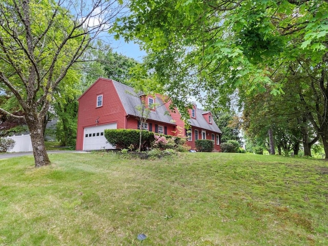 182 W Main St, Westborough, MA 01581 - view of front of property with an attached garage and a shingled roof