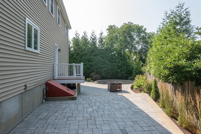 view of patio with a fire pit