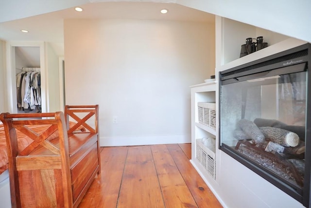 interior space with light wood-style floors, baseboards, and recessed lighting