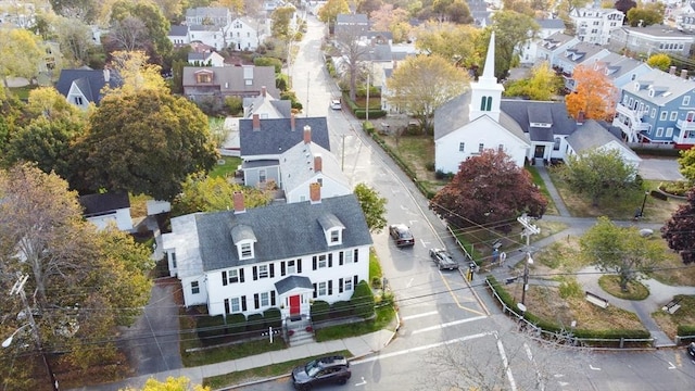 birds eye view of property with a residential view