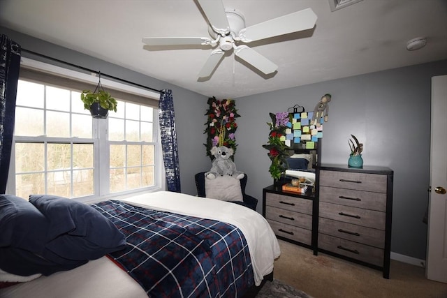 carpeted bedroom featuring a ceiling fan