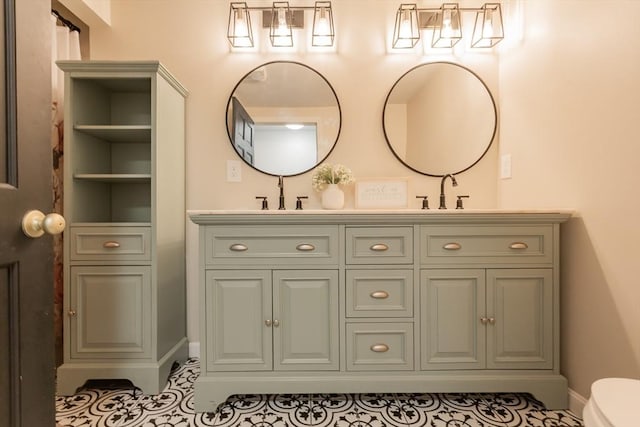 70 Oak St, Norton, MA 02766 - bathroom featuring double vanity and baseboards