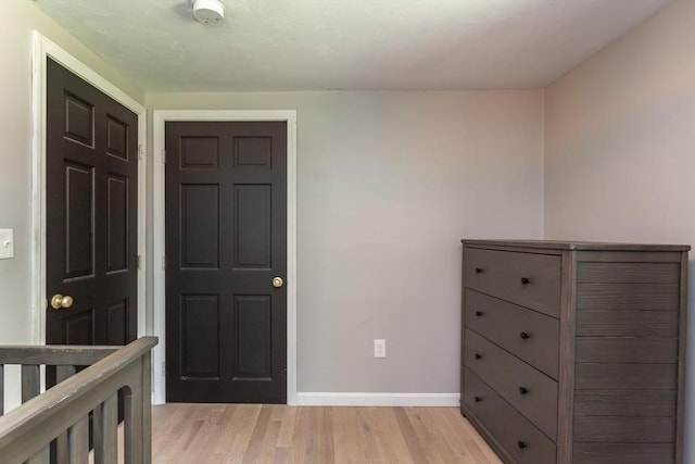70 Oak St, Norton, MA 02766 - unfurnished bedroom with light wood-type flooring and baseboards