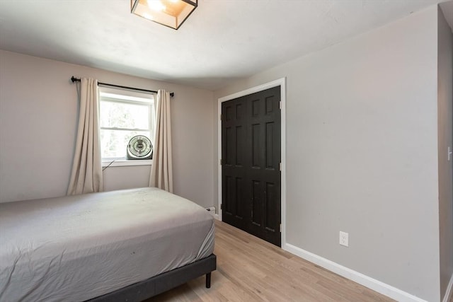 70 Oak St, Norton, MA 02766 - bedroom with light wood finished floors and baseboards