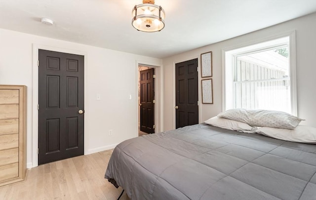70 Oak St, Norton, MA 02766 - bedroom featuring light wood-type flooring and baseboards