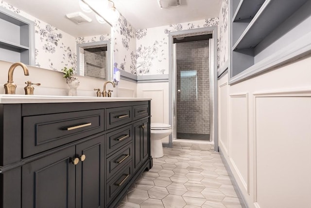 70 Oak St, Norton, MA 02766 - bathroom featuring wallpapered walls, double vanity, wainscoting, a stall shower, and tile patterned floors