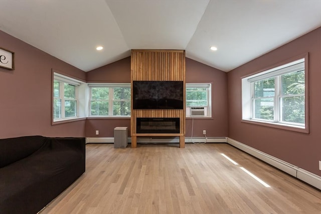 70 Oak St, Norton, MA 02766 - living area with light wood-type flooring, lofted ceiling, cooling unit, baseboard heating, and a large fireplace