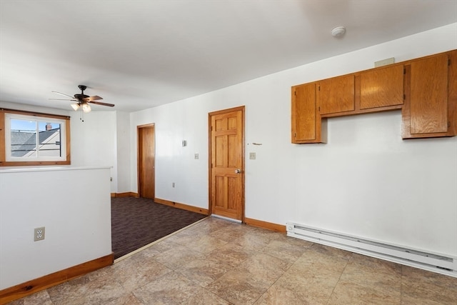 interior space featuring baseboard heating and ceiling fan