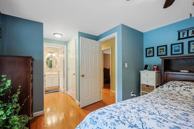 80 Summer St, Walpole, MA 02071 - bedroom with light wood finished floors, connected bathroom, and ceiling fan