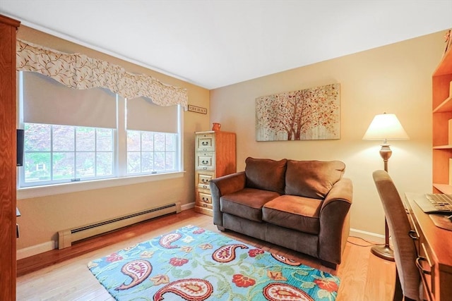 80 Summer St, Walpole, MA 02071 - living area featuring baseboard heating, wood finished floors, and baseboards