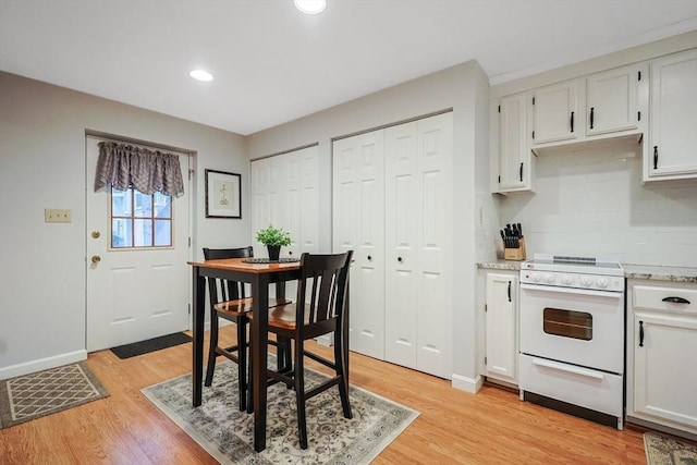 80 Summer St, Walpole, MA 02071 - dining room featuring light wood-style flooring, recessed lighting, and baseboards