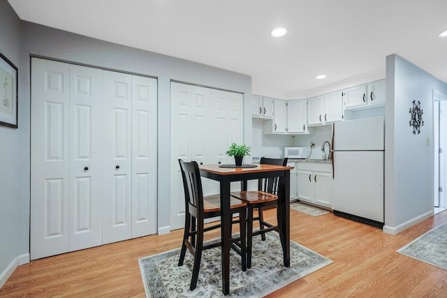 80 Summer St, Walpole, MA 02071 - dining area featuring light wood-style floors, recessed lighting, and baseboards