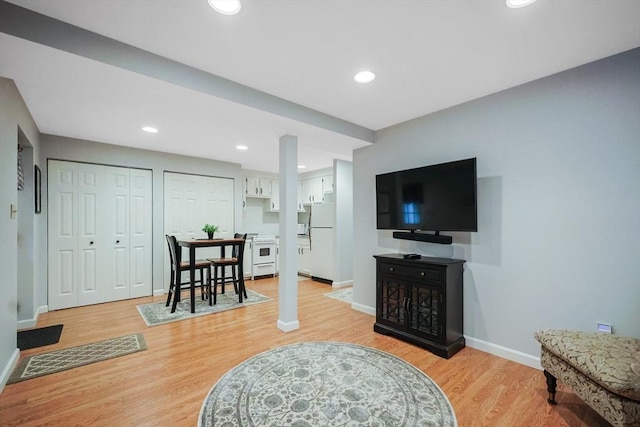 80 Summer St, Walpole, MA 02071 - living room with baseboards, light wood-style flooring, and recessed lighting