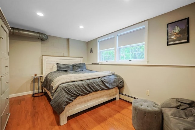 80 Summer St, Walpole, MA 02071 - bedroom with a baseboard radiator, light wood-style flooring, recessed lighting, and baseboards