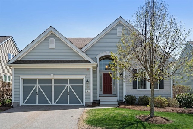 8 Heartwood Way Unit 8, Hopkinton, MA 01748 - view of front of home featuring asphalt driveway, an attached garage, roof with shingles, and a front lawn