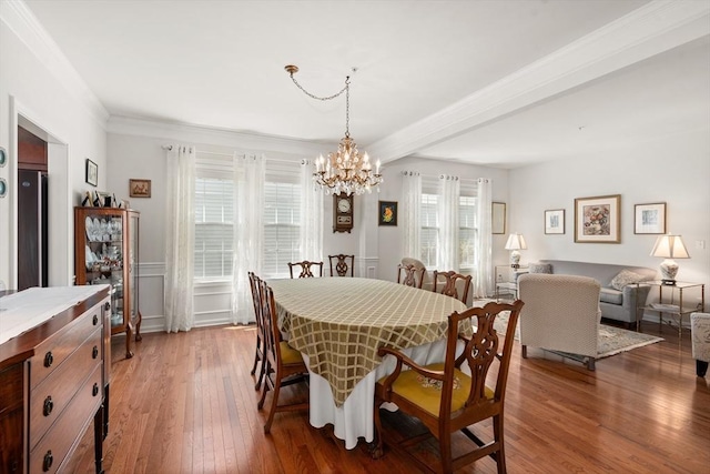8 Heartwood Way Unit 8, Hopkinton, MA 01748 - dining room featuring a chandelier, wood finished floors, ornamental molding, and beam ceiling