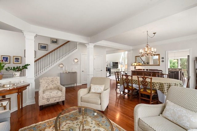 8 Heartwood Way Unit 8, Hopkinton, MA 01748 - living room featuring wood finished floors, stairs, and ornate columns