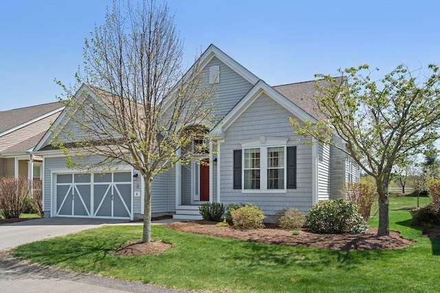 8 Heartwood Way Unit 8, Hopkinton, MA 01748 - view of front of home featuring driveway, a front lawn, and a garage