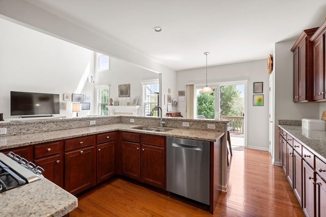 8 Heartwood Way Unit 8, Hopkinton, MA 01748 - kitchen with a sink, dishwasher, open floor plan, wood finished floors, and light stone countertops