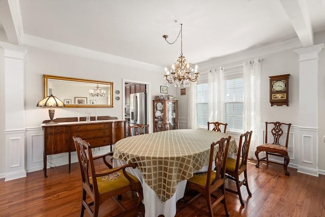 8 Heartwood Way Unit 8, Hopkinton, MA 01748 - dining space featuring a chandelier, dark wood-style flooring, a decorative wall, crown molding, and a wainscoted wall