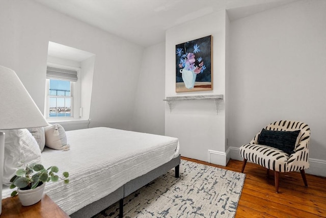 bedroom with wood-type flooring