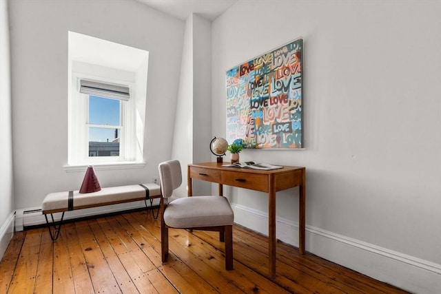 office area featuring wood-type flooring and baseboard heating