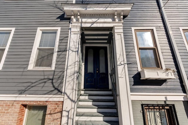 doorway to property featuring french doors