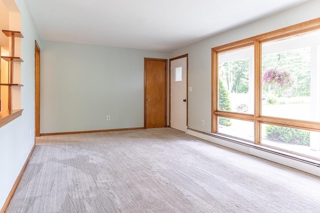 59 Mountain Rd, Holyoke, MA 01040 - carpeted spare room featuring a baseboard radiator and baseboards
