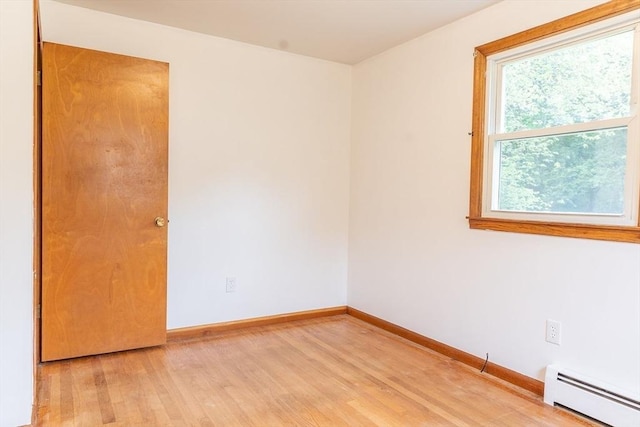 59 Mountain Rd, Holyoke, MA 01040 - empty room featuring baseboard heating and light wood finished floors