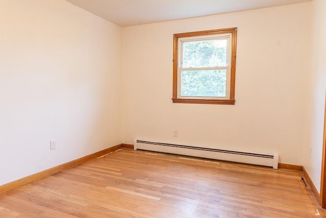59 Mountain Rd, Holyoke, MA 01040 - empty room featuring baseboard heating and light wood-type flooring
