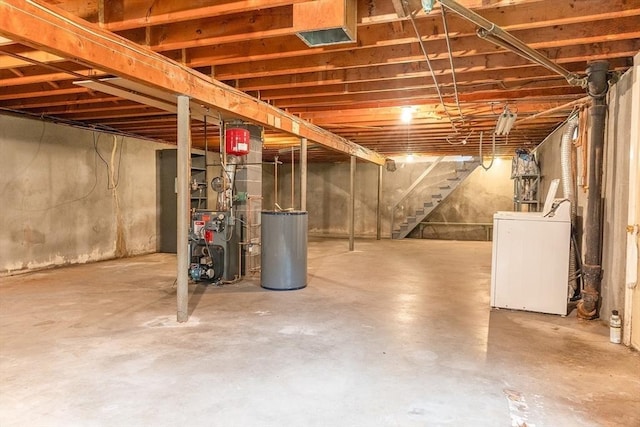 59 Mountain Rd, Holyoke, MA 01040 - unfinished basement featuring washer / dryer, stairs, water heater, and a heating unit