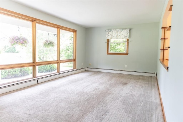 59 Mountain Rd, Holyoke, MA 01040 - unfurnished room featuring carpet floors and a baseboard radiator