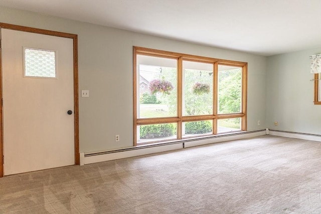 59 Mountain Rd, Holyoke, MA 01040 - spare room with carpet floors and a baseboard heating unit