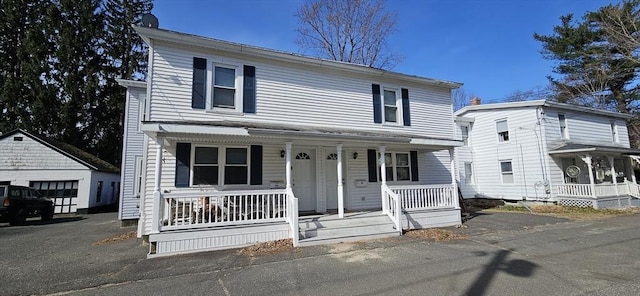 2018-2020 Prospect St, Palmer, MA 01080 - traditional-style house with covered porch and an outdoor structure