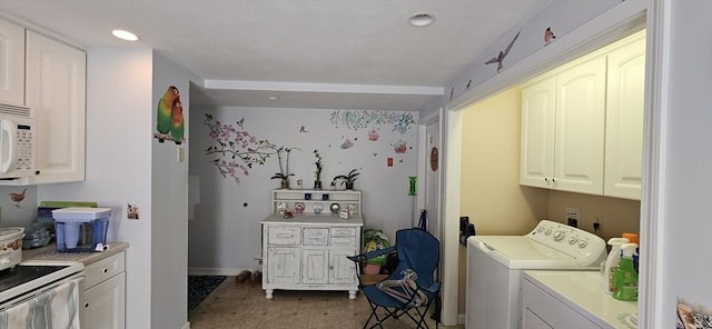 2018-2020 Prospect St, Palmer, MA 01080 - laundry area featuring separate washer and dryer, cabinet space, and recessed lighting